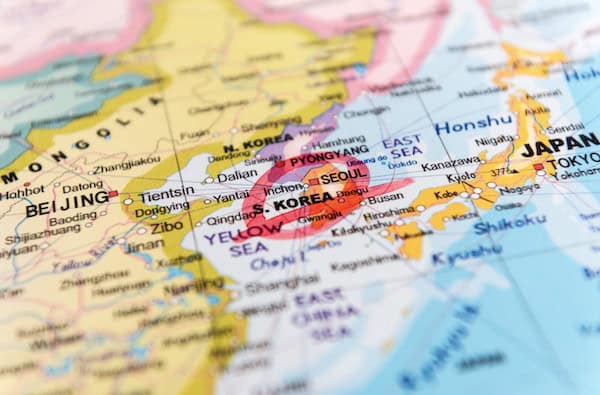 Colorful map with Korea circled in red marker